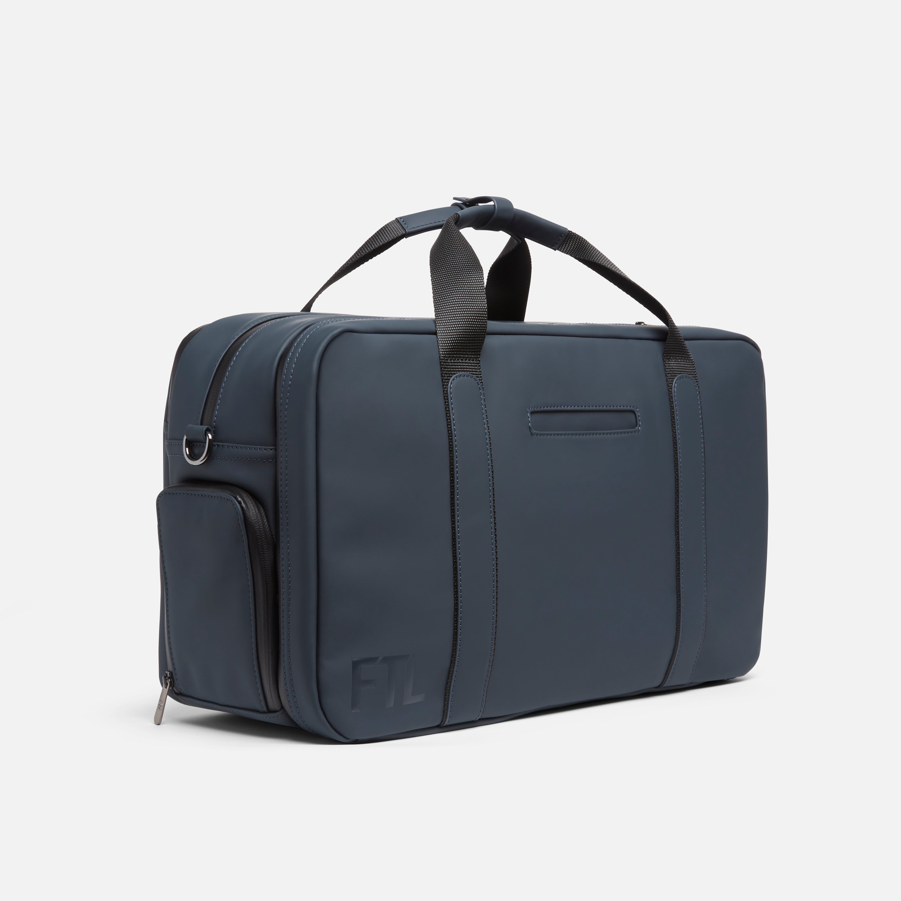 Gym duffel bag for men with sleek navy design, side pocket, and durable handles for versatile everyday carry. Essex Blue