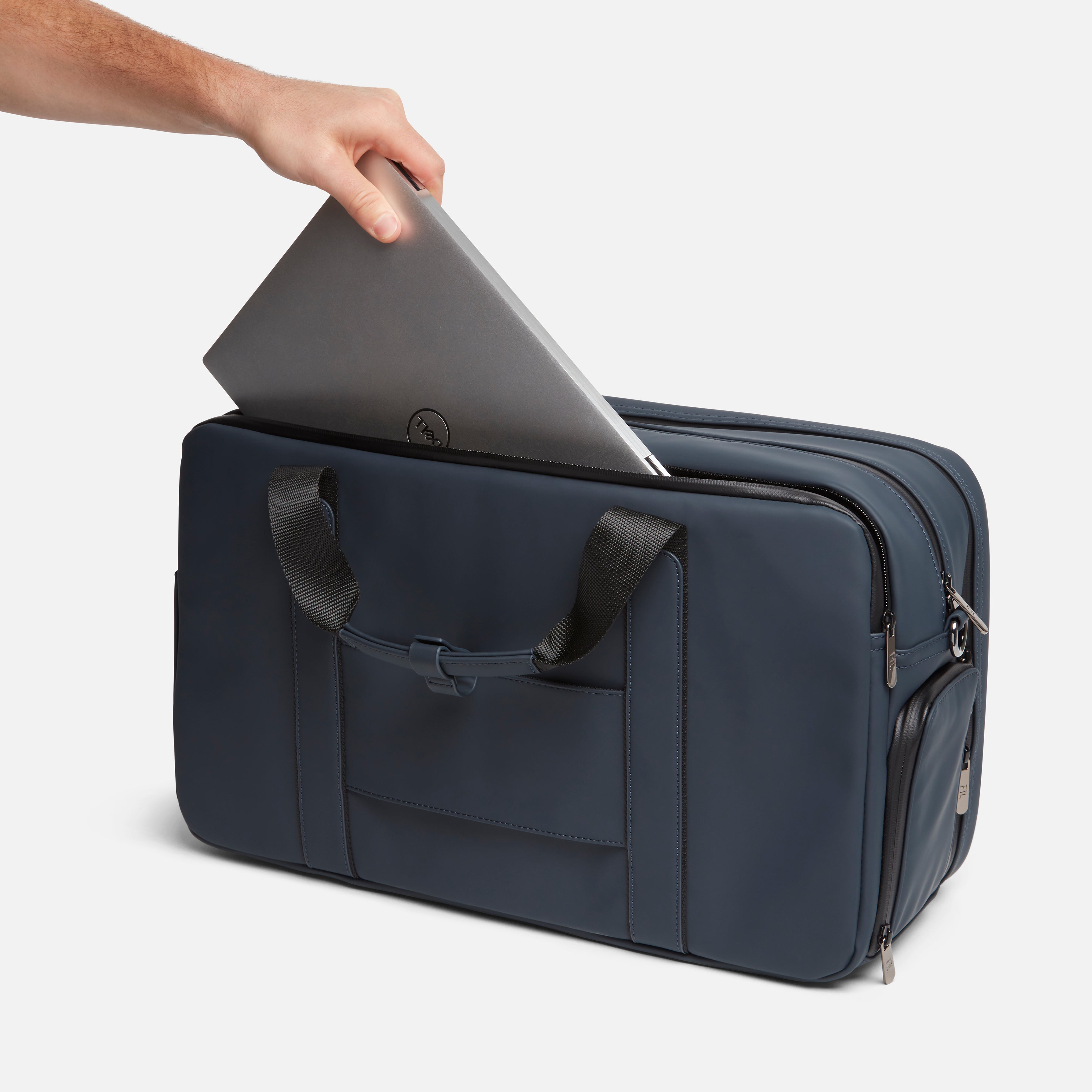 Men's laptop duffel bag with sleek navy design and padded compartment for secure tech transport.