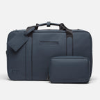 The best office gym bag in navy with matching toiletry pouch and tag, perfect for professional and fitness organization.