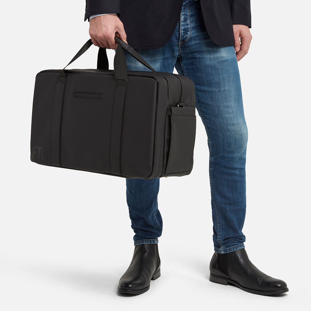 Gym and office bag in black with structured silhouette and side pocket, ideal for business attire and workout gear.