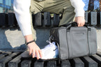 Office to gym bag with separate shoe compartment shown in use by a man sitting on an outdoor bench.

Abbot Green,Kenmare Black,Essex Blue, Stone Grey