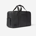 Men's gym duffel bag in matte black with top handles and side pocket, perfect for workouts and daily carry.