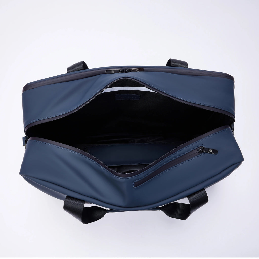 Gym work bag with spacious interior, secure zipper pocket, and sleek blue exterior for stylish organization.

Abbot Green,Kenmare Black,Essex Blue, Stone Grey