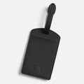 Black PU leather FTL luggage tag with embossed logo and buckle strap.