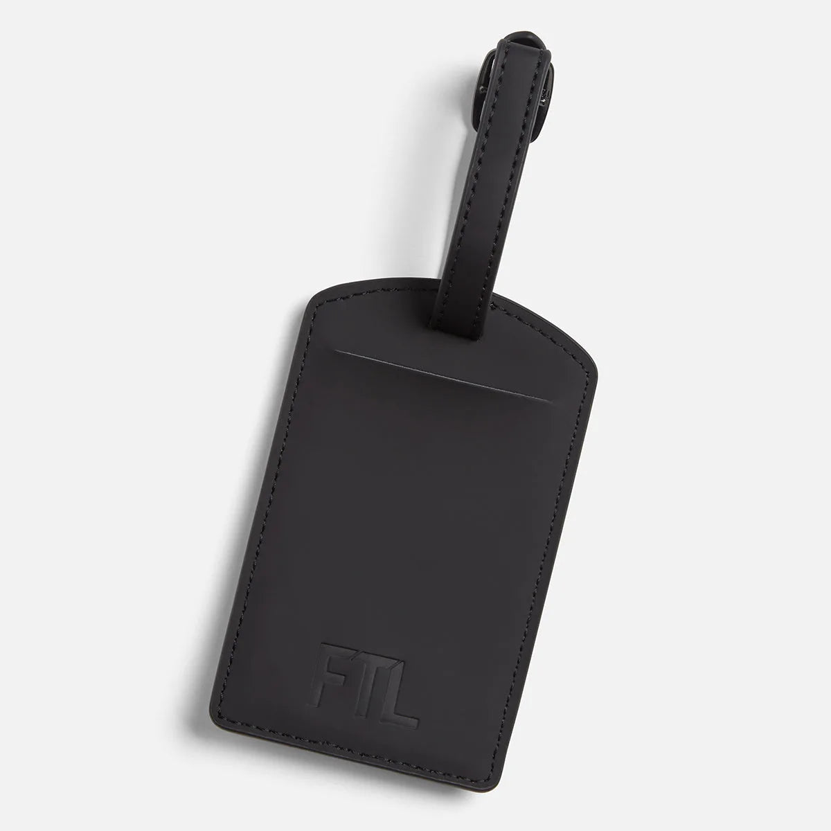 Black PU leather FTL luggage tag with embossed logo and buckle strap.