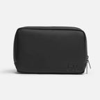 Black water-resistant FTL dopp kit organizer with top zipper and subtle logo.