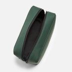 Green FTL dopp kit unzipped, revealing a black-lined interior for toiletries and tech.