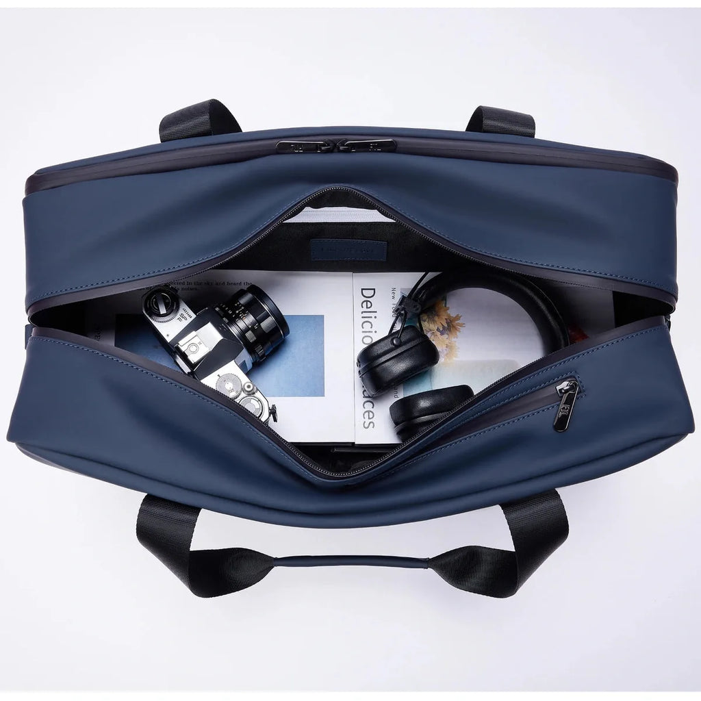 The best gym duffle bags for men with spacious interior storing camera, magazines, and headphones, perfect for creatives on the go.

Abbot Green,Kenmare Black,Essex Blue, Stone Grey